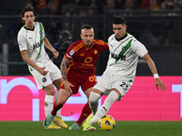 Angelino from A.S. Roma and Cristian Volpato from U.S. Sassuolo are competing during the 29th day of the Serie A Championship between A.S. R...