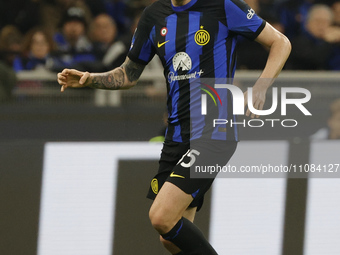 Alessandro Bastoni of Inter is controlling the ball during the Serie A soccer match between Inter FC and SSC Napoli at Stadio Meazza in Mila...
