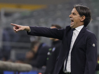 Simone Inzaghi, coach of Inter, is reacting during the Serie A soccer match between Inter FC and SSC Napoli at Stadio Meazza in Milan, Italy...