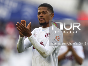 Leon Bailey is thanking the traveling supporters at full time during the Premier League match between West Ham United and Aston Villa at the...