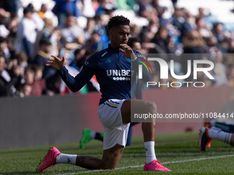 Junior Firpo of Leeds United is warming up before the Sky Bet Championship match between Leeds United and Millwall at Elland Road in Leeds,...