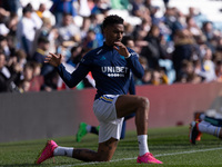 Junior Firpo of Leeds United is warming up before the Sky Bet Championship match between Leeds United and Millwall at Elland Road in Leeds,...