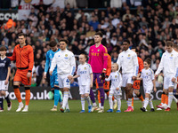 Ethan Ampadu of Leeds United is leading the team out before the Sky Bet Championship match against Millwall at Elland Road in Leeds, on Marc...