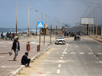 Displaced Palestinians are fleeing from the area near Gaza City's al-Shifa hospital and are walking along the coastal highway as they arrive...
