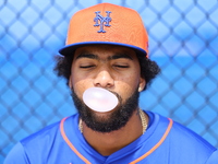 New York Mets minor league pitcher Joseph Yabbour #61 is blowing a bubble during spring training workouts at the Mets Minor League Complex i...