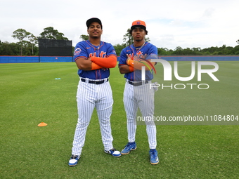 Andriel Lantigua #44 and Christopher Suero #47, minor league catchers for the New York Mets, are posing for a photo during spring training w...