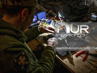 A serviceman is assembling a reusable bomber drone in Zaporizhzhia, Ukraine, on March 8, 2024. NO USE RUSSIA. NO USE BELARUS. (