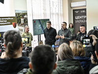 Acting Mayor Anatolii Kurtev, authorized representative of the Ministry of Defense of Ukraine on recruiting Oleksii Bezhevets, and head of Z...
