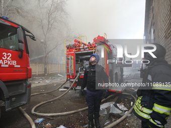 Firefighters are eliminating the consequences of a rocket attack by Russian troops on a private enterprise in Kharkiv, northeastern Ukraine,...