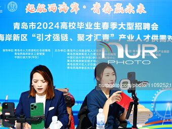 College graduates are attending a job fair in Qingdao, Shandong Province, China, on March 23, 2024. (