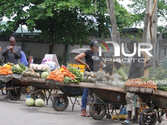 Fruit and vegetable sellers are waiting for buyers as most raw food vendors are recording low sales during the Ramadan period in Ogba, Lagos...