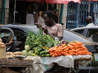 A vegetable seller is awaiting buyers as most raw food vendors are recording low sales during the Ramadan period in Ogba, Lagos, Nigeria, on...