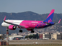 An Airbus A321-271NX, sporting the Wizz Air Abu Dhabi livery, is landing at Barcelona Airport in Barcelona, Spain, on February 29, 2024. (