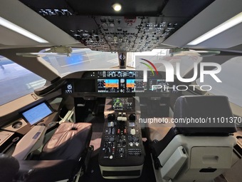 The cockpit of a C919 passenger jet is being seen at the COMAC Shanghai Aircraft Design and Research Institute in Shanghai, China, on March...