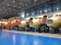 Workers are assembling the ARJ21 passenger aircraft on the production line at COMAC Shanghai Aircraft Manufacturing Co LTD in Shanghai, Chin...