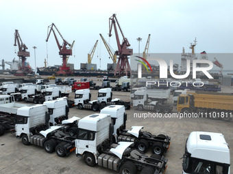 Vehicles are being prepared for export at the port of Lianyungang in Jiangsu Province, East China, on March 27, 2024. (