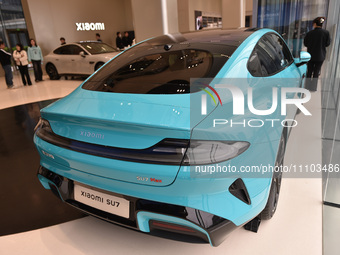 A Xiaomi electric supercar is on display at the Xiaomi East China headquarters in Nanjing, China, on March 28, 2024. Xiaomi Car is officiall...