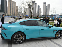 A Xiaomi electric supercar is on display at the Xiaomi East China headquarters in Nanjing, China, on March 28, 2024. Xiaomi Car is officiall...