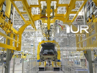 Car bodies are moving on a production line at LI AUTO Manufacturing base in Changzhou, Jiangsu province, China, on March 27, 2024. Over the...