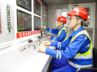 A worker is controlling the ''Haitian'' shield machine at the construction site of the Second Undersea Tunnel project at Qingdao Jiaozhou Ba...