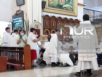 Franciscans and laypeople are participating in the washing of the feet at the Franciscan-run Basilica Minore de San Pedro Bautista in Quezon...
