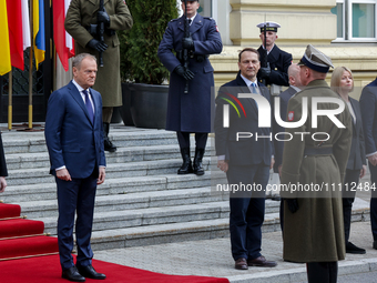 Poland's Prime Minister, Donald Tusk, is arriving for the welcome ceremony for Ukraine's Prime Minister, Denys Shmyhal (not shown), ahead of...