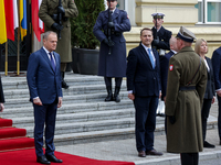 Poland's Prime Minister, Donald Tusk, is arriving for the welcome ceremony for Ukraine's Prime Minister, Denys Shmyhal (not shown), ahead of...