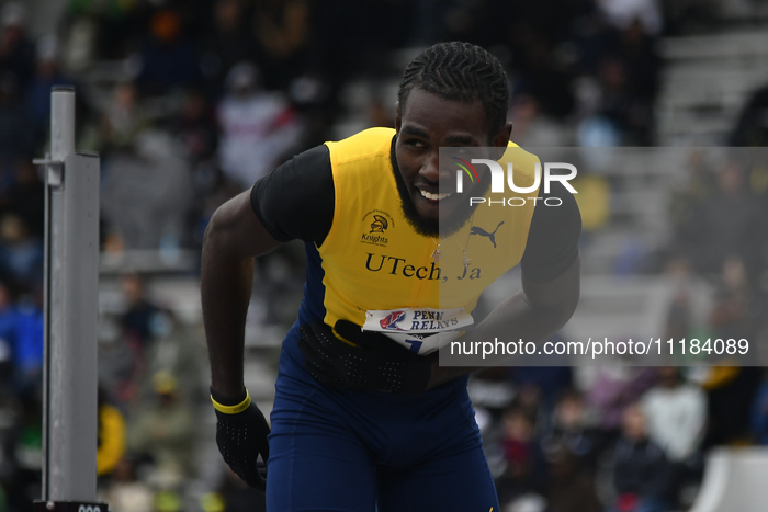 Raymond Richards from UTech is thanking fans after competing in the College Men's High Jump Championship on day 3 of the 128th Penn Relays C...