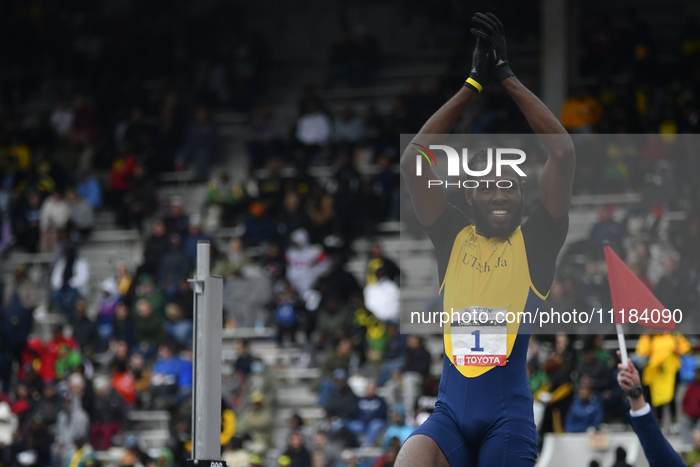 Raymond Richards from UTech is thanking fans after competing in the College Men's High Jump Championship on day 3 of the 128th Penn Relays C...