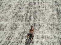 A local tourist bathes at the decommissioned Wawa Dam in the municipality of Rodriguez, Rizal province on World Water Day, 22 March 2016. Th...