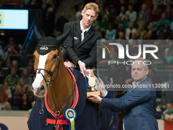 Marcus Ehning at the prize ceremony after winning the 2016 Gothenburg Grand Prix  at Scandinavium Arena in Gothenburg, Sweden on March 25, 2...