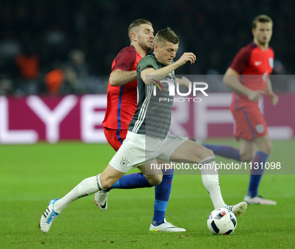 Toni Kroos (Germany), Jordan Henderson (England)

 in action during the international friendly soccer match between Germany and England at...