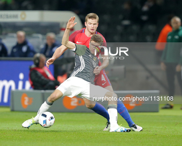 Thomas Mller (Germany),Eric Dier (England)

 in action during the international friendly soccer match between Germany and England at the O...