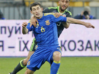 Taras Stepanenko (L) of Ukraine national football team in action against Taylor (R) of Wales national football team,during the friendly foot...