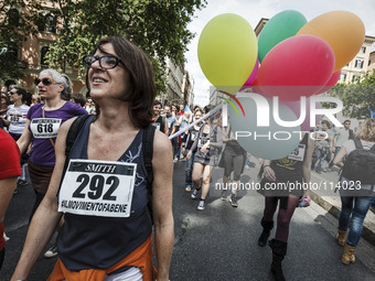 Rome, Italy – May 17, 2014: A woman marches during a nationwide demonstration against the privatization of the commons and the austerity pol...