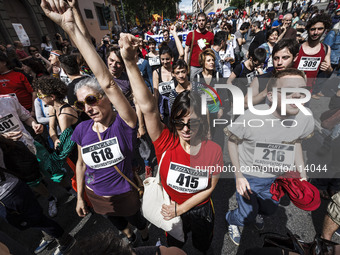 Rome, Italy – May 17, 2014: Protesters shout slogans during a nationwide demonstration against the privatization of the commons and the aust...