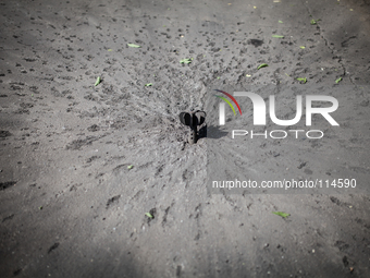 the signes of the explosion of a bomb (Photo by Sandro Maddalena/NurPhoto)