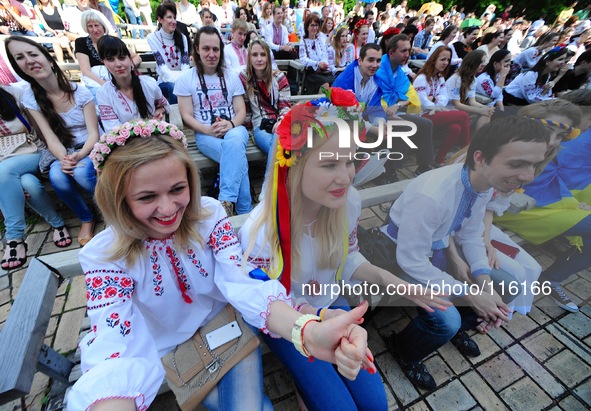 Hundreds of Ukrainians cheers several traditional music entertainment  music festival in Mariinsky Park on a hot Spring afternoon. 