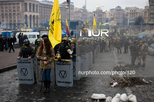 Anti-government protesters take part in demonstration on Maidan square in Kiev on February 14, 2014. Russia will release the next installmen...