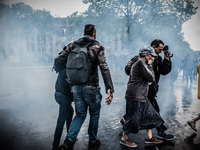 Police launched tear gasses over the place Vauban during a protest after the French government made use of the constitution's Article 49-3 a...