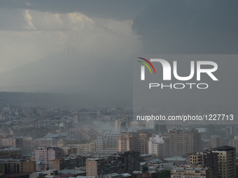 A panoramic view of Yerevan at 3pm today, seen from Cafesjian Center Arts Museum, as the Armenian capital was hit this afternoon by a heavy...