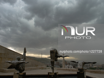 A very dark sky seen over Yerevan seen near Statues of Divers, in Cafesjian Center Arts Museum.
Yerevan was hit this afternoon by a heavy st...