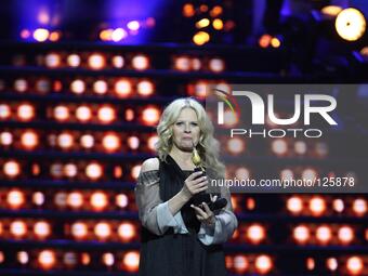 Sopot, Poland 30th, May 2014 Polish singer Urszula holds the Amber Nightingale prize on the stage during the Top Trendy 2014 festival at For...