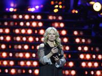 Sopot, Poland 30th, May 2014 Polish singer Urszula holds the Amber Nightingale prize on the stage during the Top Trendy 2014 festival at For...