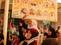 A Palestinian during a rally to show solidarity with Palestinian prisoners held in Israeli jails, in Gaza City June 2, 2014. Some 120 Palest...