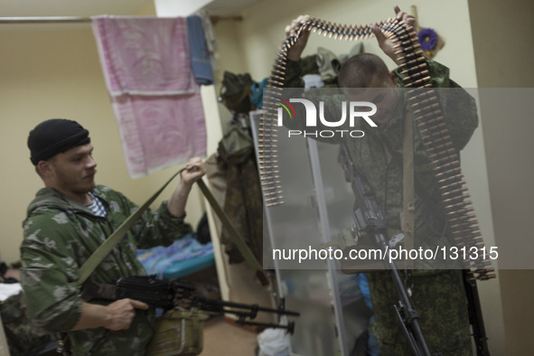 Militiamen from the Russian Orthodox Army seen inside their headquarters in the occupied SBU building in Donetsk, eastern Ukraine, on May 5t...