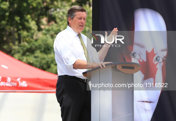 Toronto Mayor John Tory delivers a speech during the official launch ceremony of the 2016 Toronto Caribbean Carnival at Nathan Philips Squar...