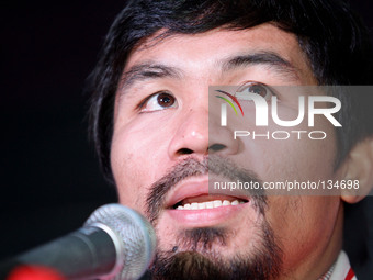 Makati, Philippines - Filipino boxing champion Manny Pacquiao answers questions from the media after being appointed as head coach of KIA, a...
