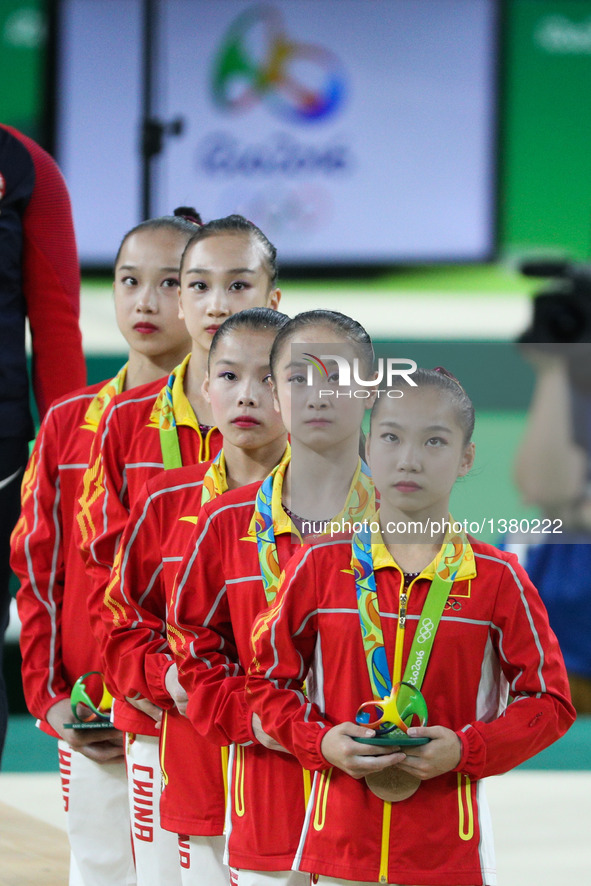 Athletes of China attend the awarding ceremony of the women's team final of Artistic Gymnasitcs at the 2016 Rio Olympic Games in Rio de Jane...