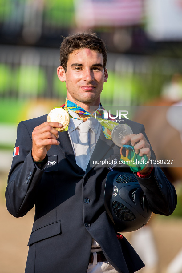 Astier Nicolas of France celebrates at the awarding ceremony of the equestrian eventing individual competition at the 2016 Rio Olympic Games...